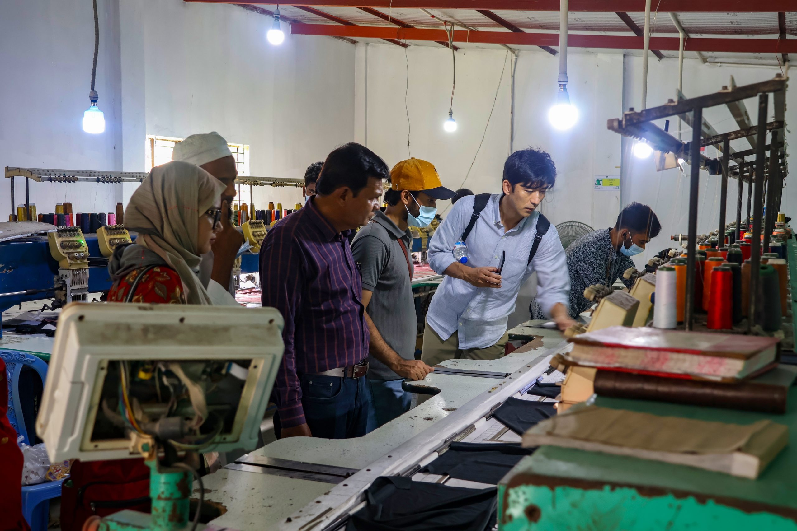 World Bank and PKSF delegation members inspect production activities at a mini-garment factory in Gogannagar, Narayanganj.