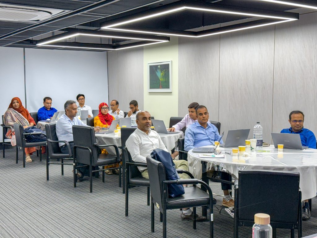 Participants engage in a practical session on using artificial intelligence tools to improve workplace productivity during the SMART Project-supported training.